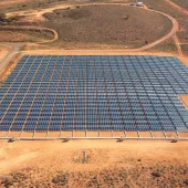 tech - aerial view of solar panels and desert panama