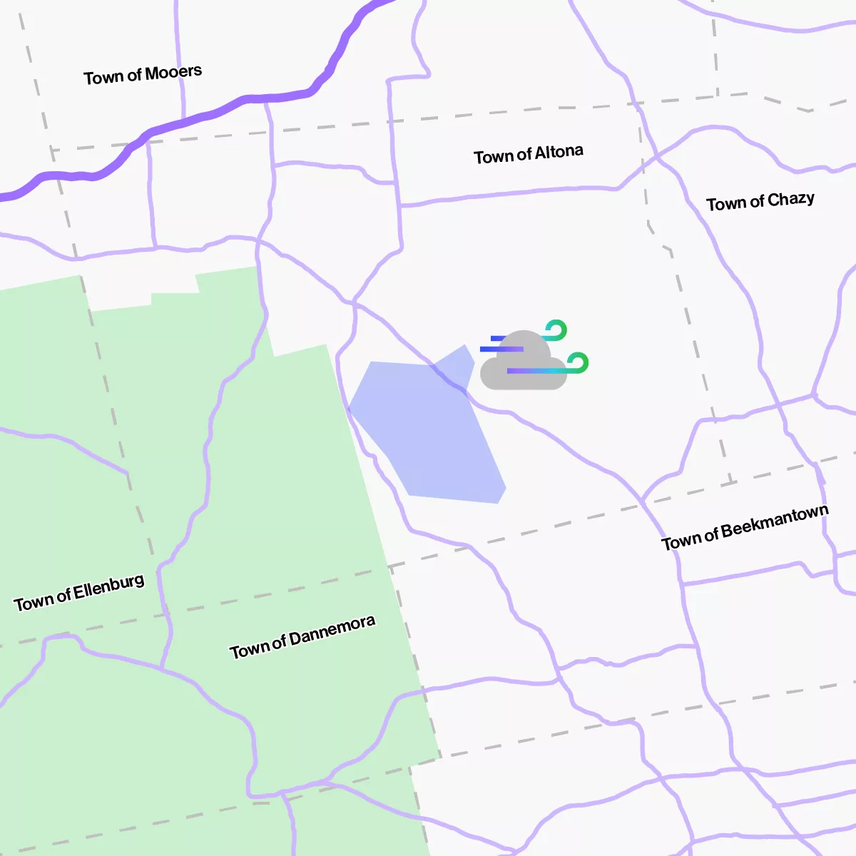 Map showing towns in a region with boundaries marked in purple. Towns include Mooers, Altona, Chazy, Beekmantown, Ellenburg, and Dannemora. A cloud icon with wind lines is near the center, and a blue polygon is also visible.